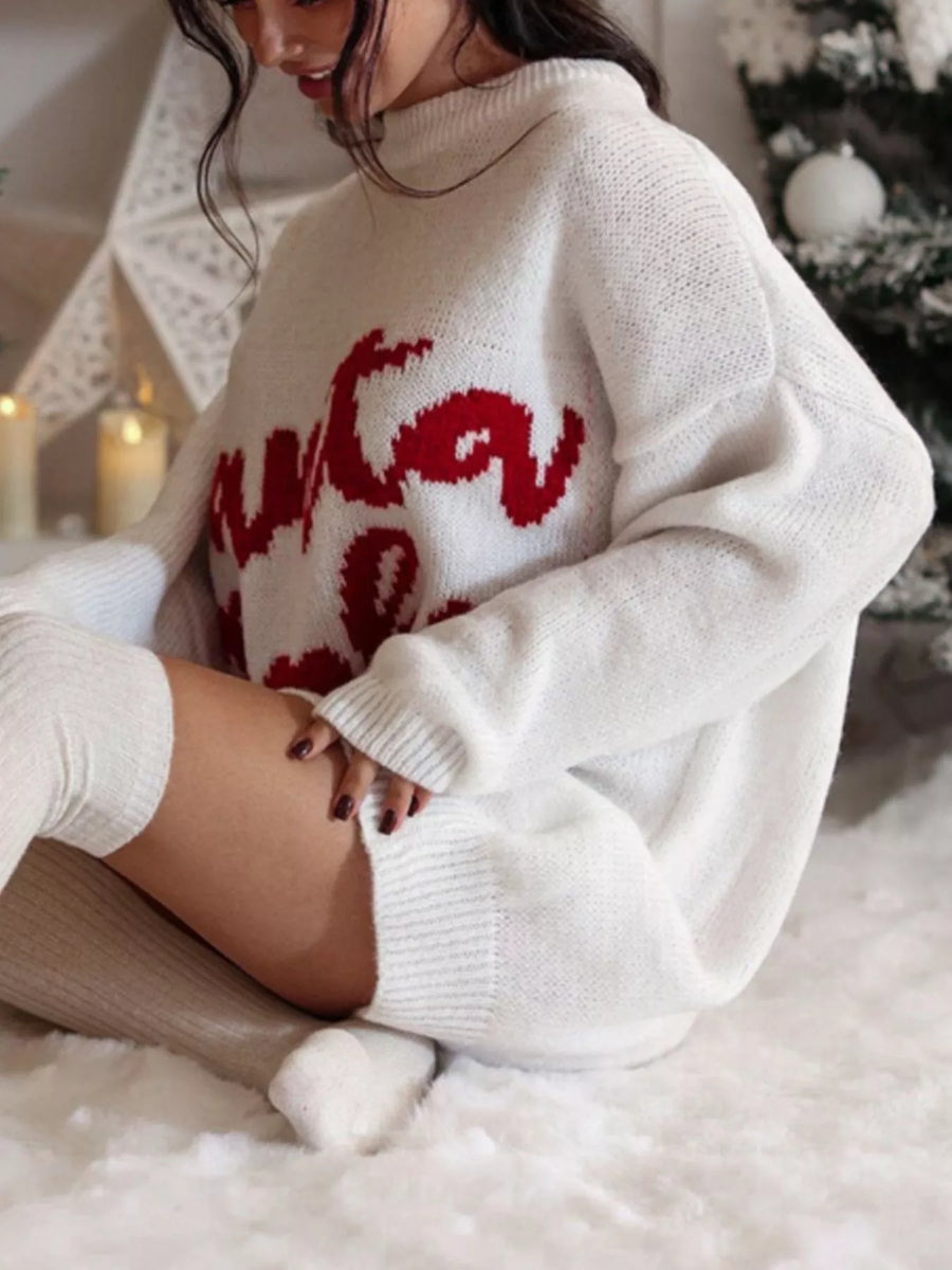 White oversized sweater dress with red graphic print, acrylic blend, mock neck, long sleeves.