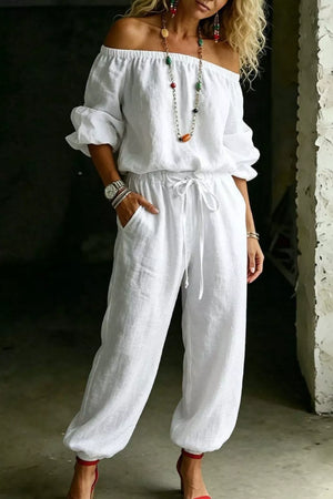 White off-shoulder cotton two-piece set with drawstring pants and puff sleeves