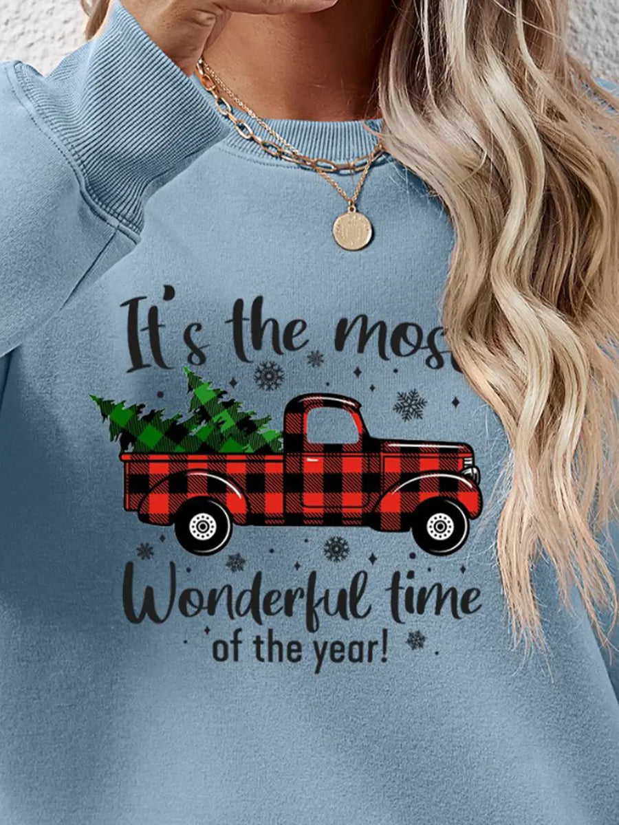 Misty Blue sweatshirt with buffalo plaid truck and Christmas tree graphic.