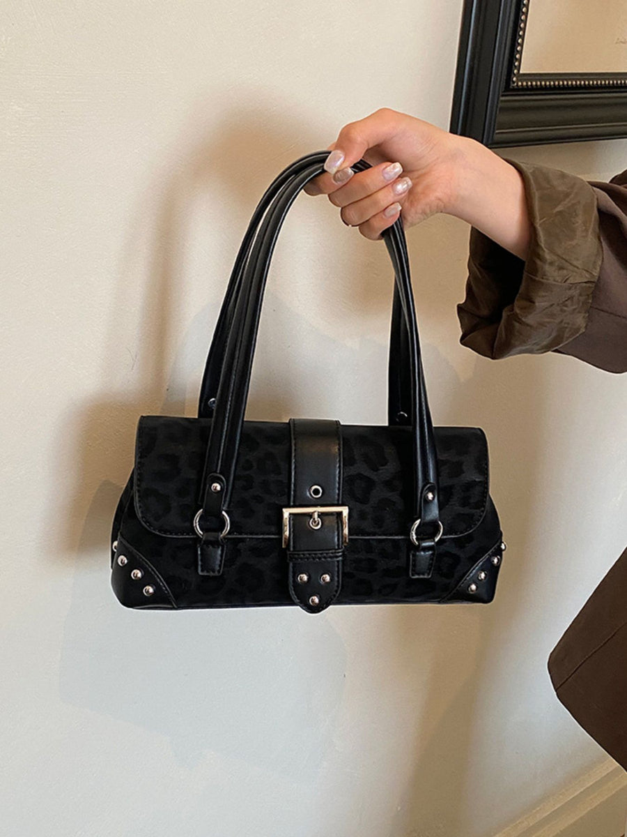 shoulder bag in Pink with leopard and buckle detail