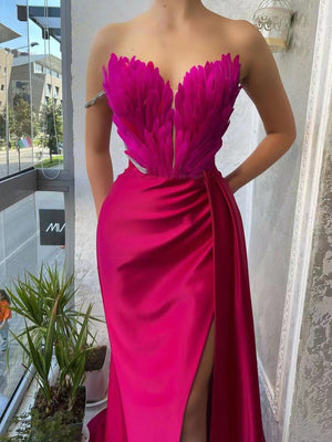 Rose red feather embellished maxi dress with draped skirt and high slit