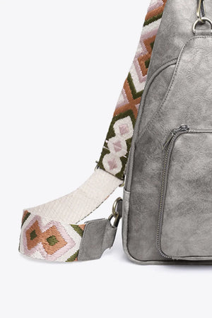 Mid Gray PU sling bag with embroidered strap featuring geometric pattern