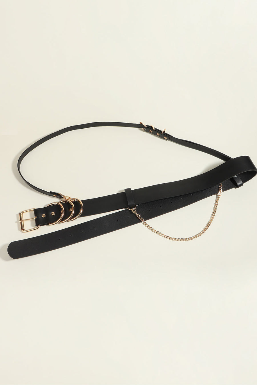 Black PU leather harness belt with gold chain detail and multiple rings.