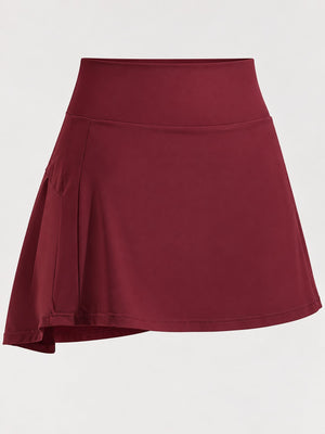 88% nylon, 12% spandex pleated skirt in Pale Yellow with flared silhouette