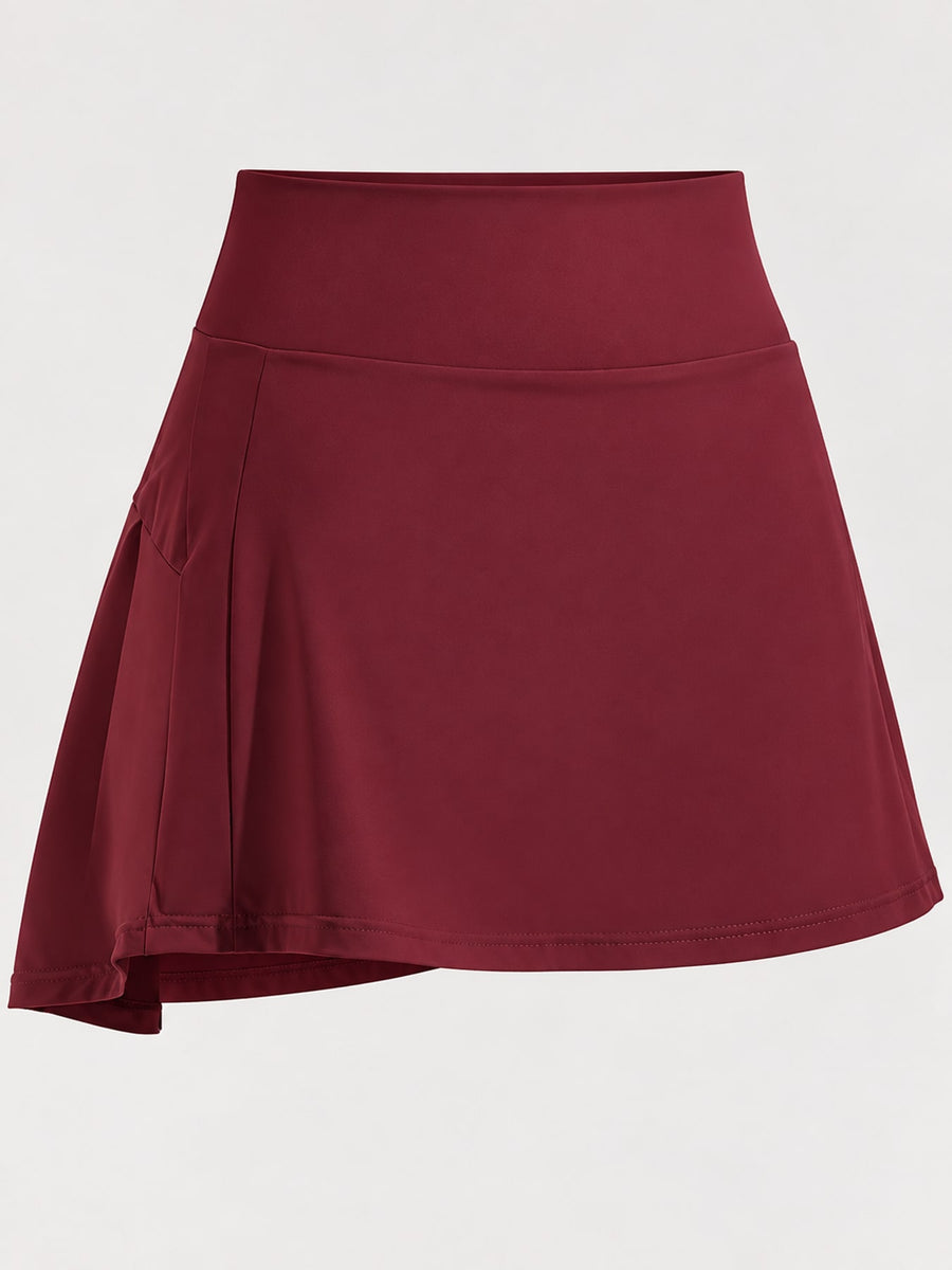 88% nylon, 12% spandex pleated skirt in Pale Yellow with flared silhouette