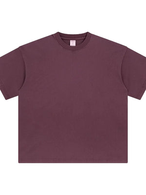 Oversized washed cotton crewneck t-shirt in plum purple with crew neckline and short sleeves.