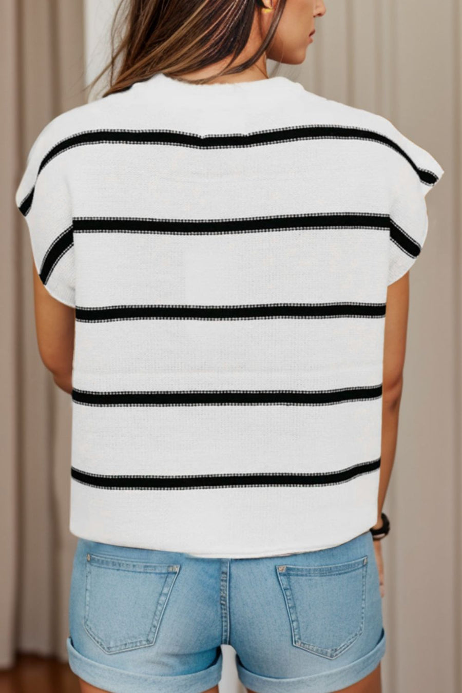 White knit shell top with black horizontal stripes and cap sleeves.