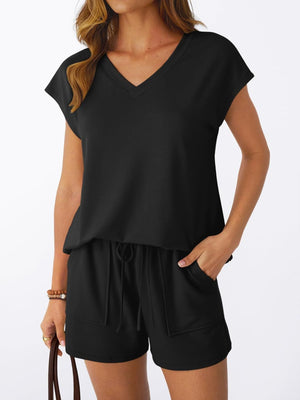 Black V-neck top with cap sleeves and drawstring shorts with pockets