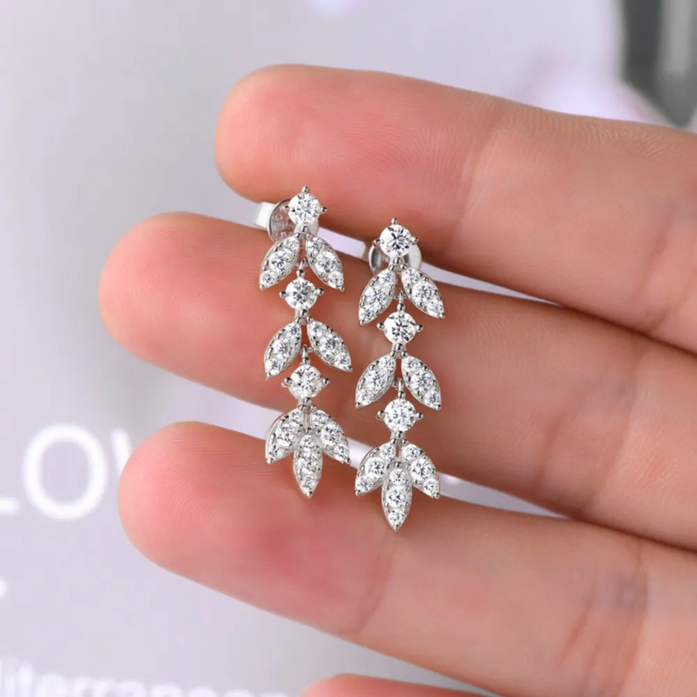 Silver cubic zirconia botanical drop earrings with leaf design