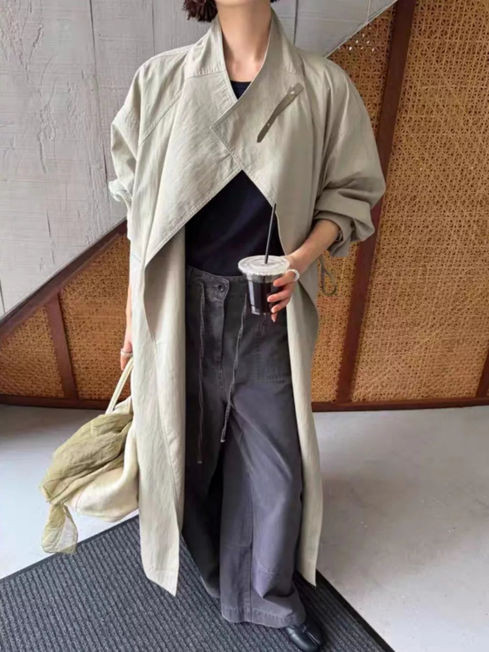 trench coat in sage green featuring tied and oversized fit
