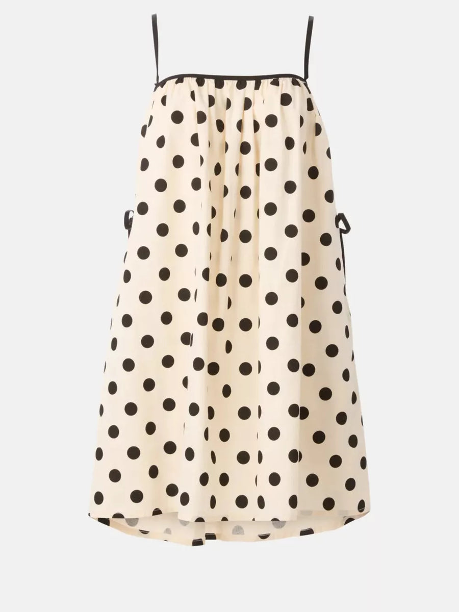 Cream polka dot midi dress with spaghetti straps and tie details