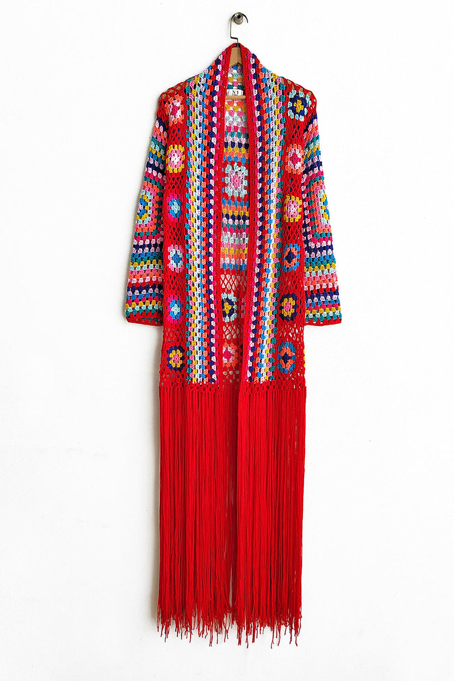 Crocheted duster in Deep Red with multicolor granny squares and long fringe.