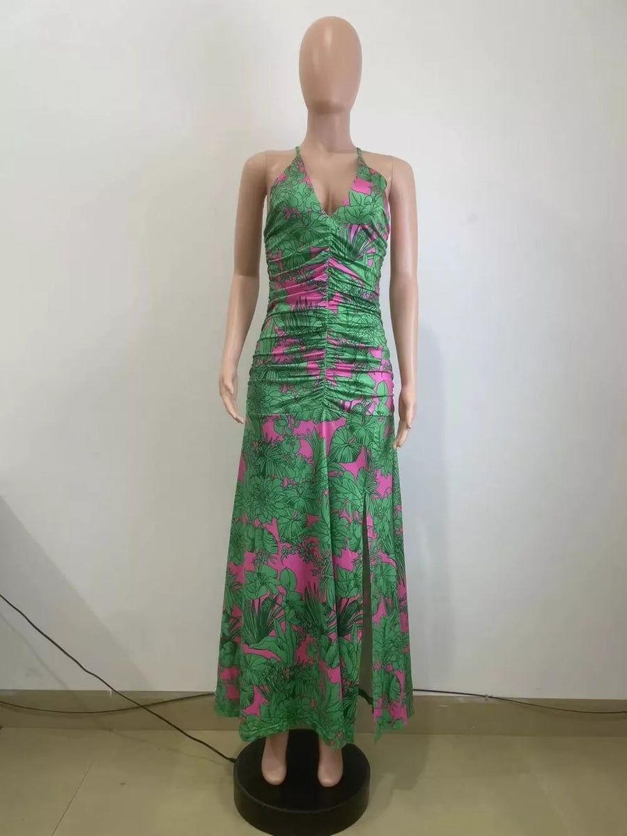 Green ruched maxi dress with tropical floral print and thigh-high slit