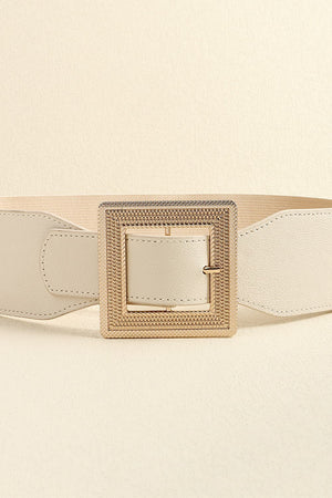Textured buckle elasticated waist belt in ivory with gold-tone square buckle.