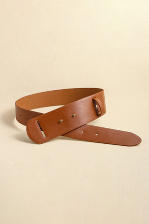 Sculpted leather waist belt in caramel with adjustable buckle detail.
