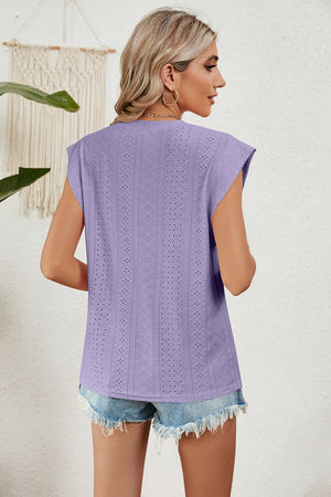 Lavender perforated shoulder-pad top with cap sleeves and a V-neck.