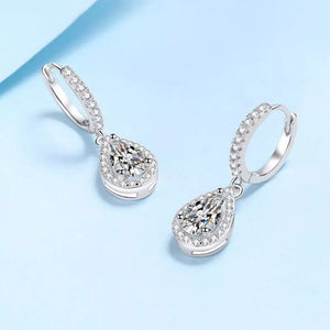 earrings in silver featuring moissanite stones and dangle fit