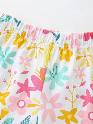 Toddler cotton blend shorts with elastic waist and colorful floral print.