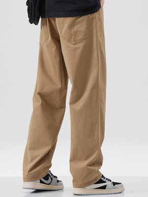Khaki cotton pants with a relaxed fit and casual styling, showing back pockets.