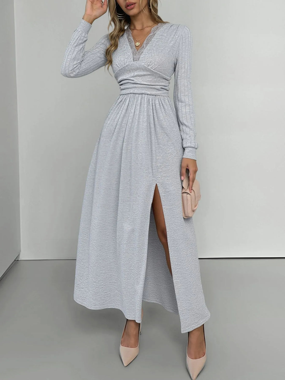 Light gray long sleeve V-neck maxi dress with lace trim and high slit