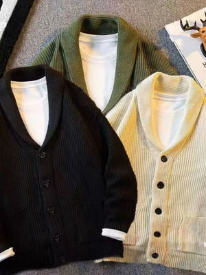 Buttoned knit cardigans in black, beige, and army green with shawl collars.
