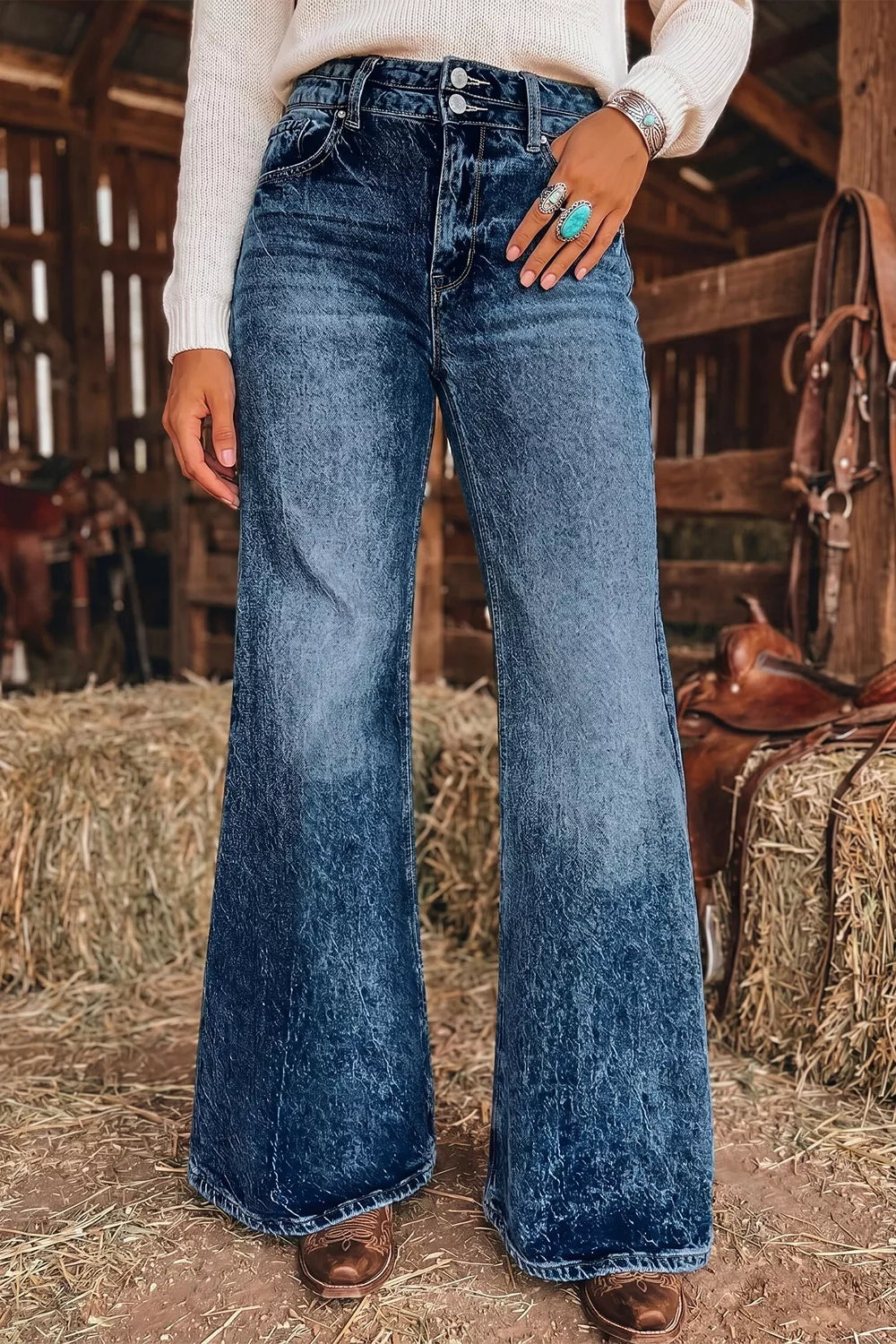flare jeans in medium wash blue featuring buttoned and flared fit