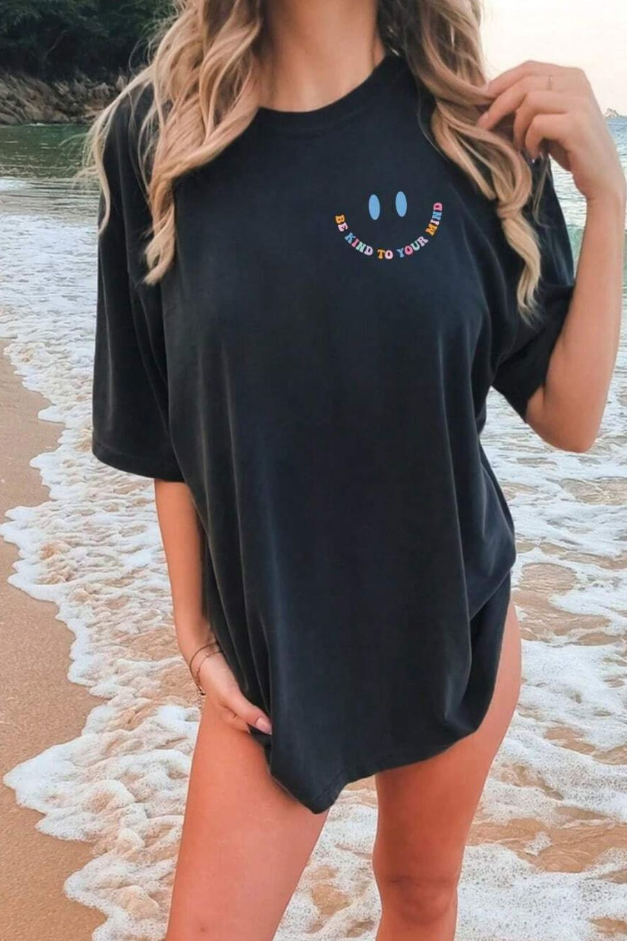 Black vintage wash t-shirt with smiley face graphic and affirmation text