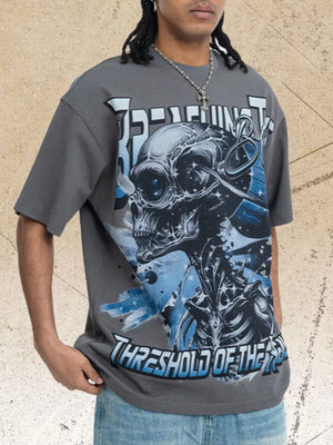 Grey men's t-shirt with bold skull graphic and text print.