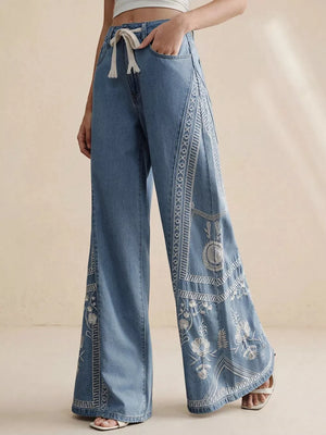 60% cotton, 40% spandex Care instructions: Machine wash cold wide-leg jeans in light blue denim with wide-leg silhouette
