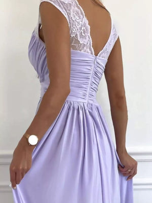 Lavender maxi dress with lace accents on the shoulders and back, featuring ruching.