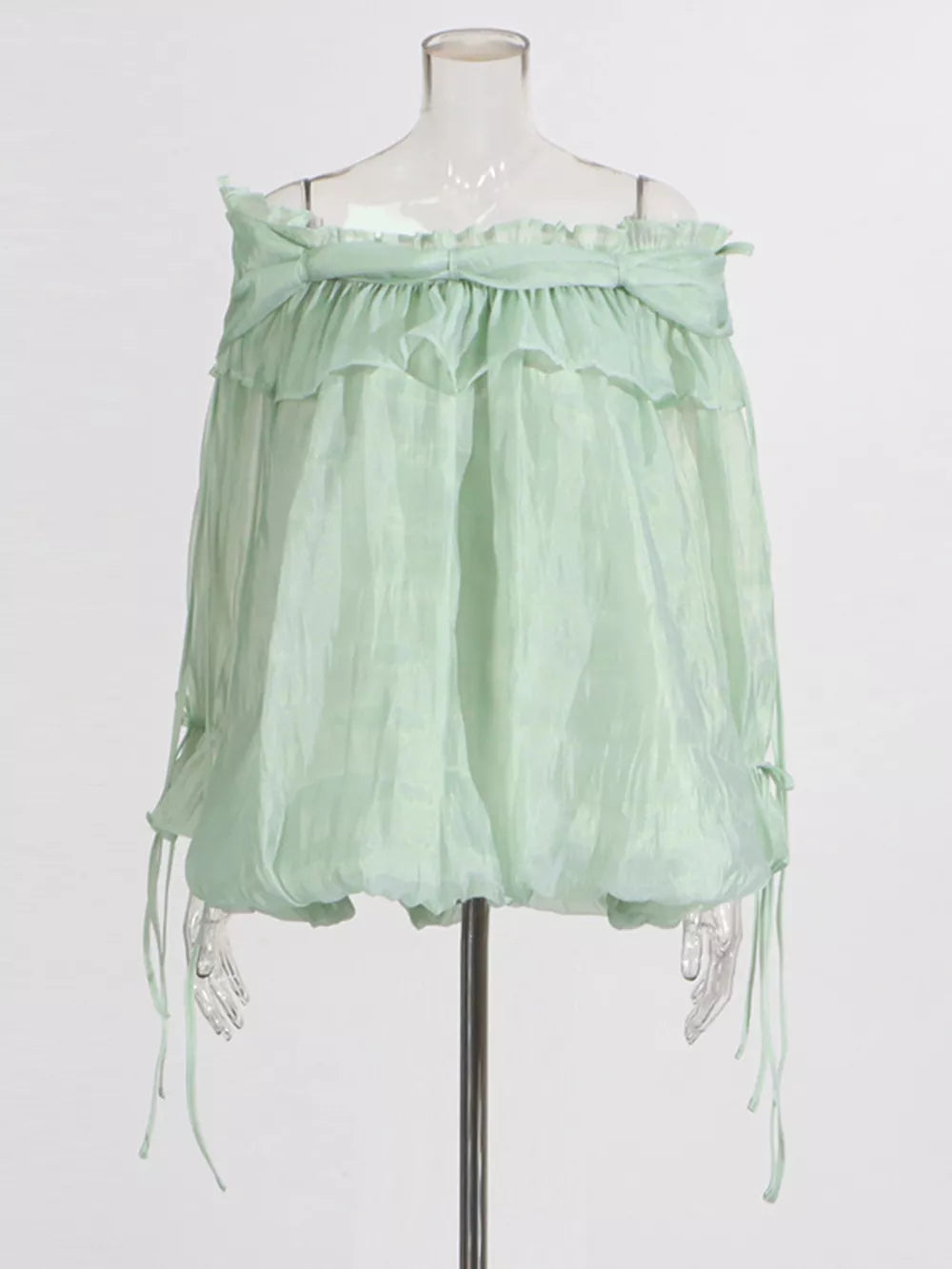 Light green off-shoulder ruffled maternity blouse with adjustable tie details
