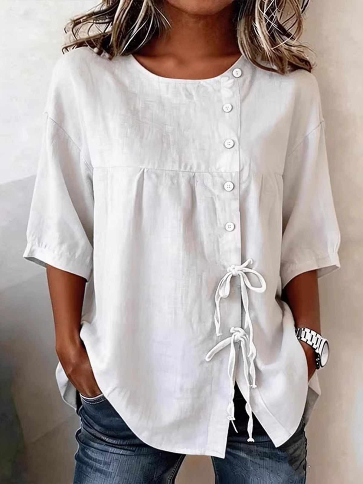 blouse in light gray featuring tied and relaxed fit