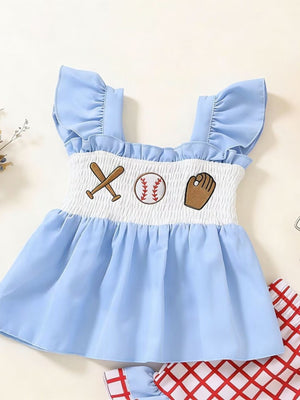 Baby blue cotton top with ruffled sleeves and smocked bodice featuring baseball embroidery.
