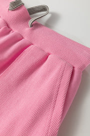 Pink cotton loungewear pants with drawstring and ribbed waistband detail