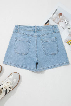 Light wash denim shorts with high rise and patch pockets