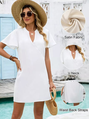 White satin mini dress with V neck, flutter sleeves and waist back straps.