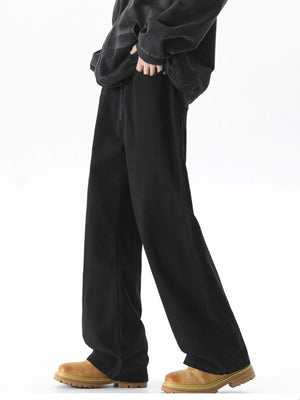 Black wide-leg comfort fit jeans with a cotton blend, styled casually.