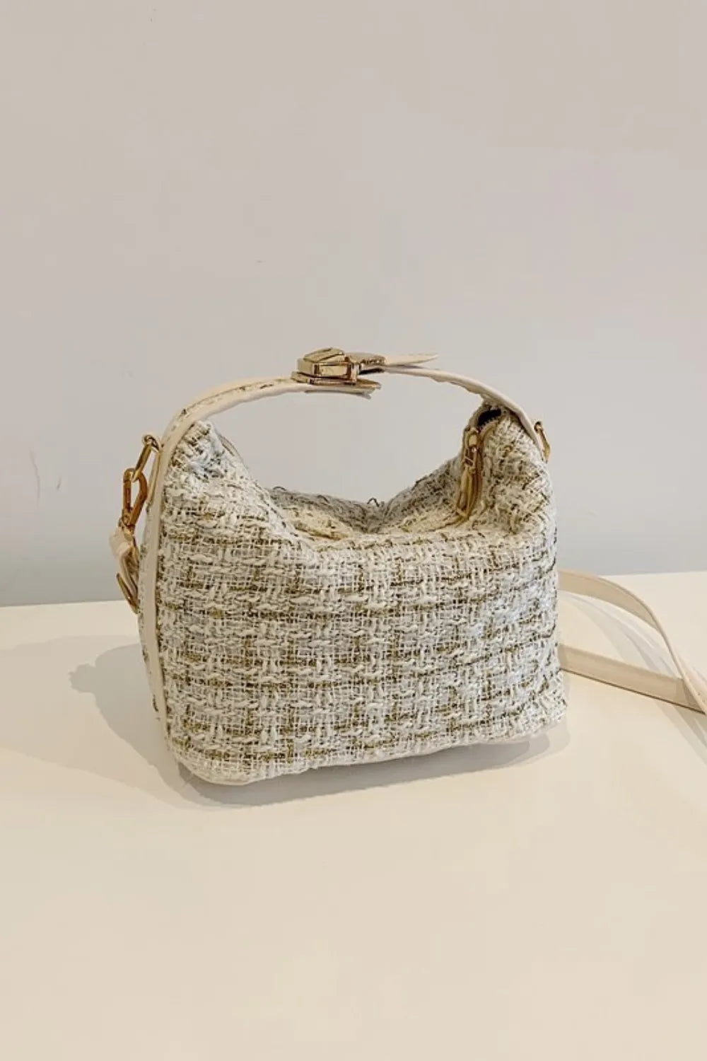 Tweed box bag in ivory with gold hardware and detachable strap