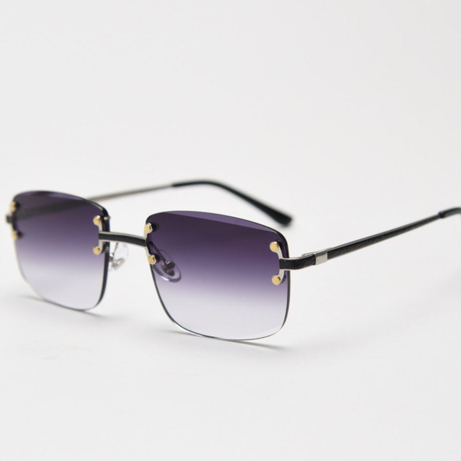 Rimless gradient tinted sunglasses with gold accents and black temples.