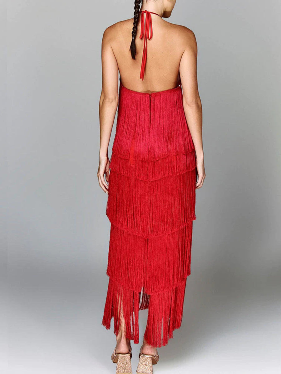 Red halter neck maxi dress with tiered fringe detail and open back.