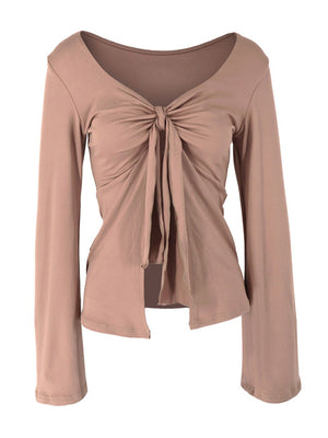 Khaki tie-front long sleeve blouse with a deep V-neck and knot detail.