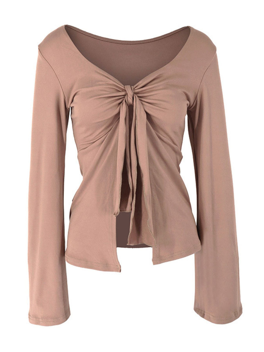 Khaki tie-front long sleeve blouse with a deep V-neck and knot detail.
