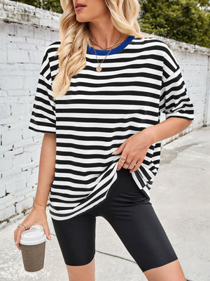 Relaxed fit black and white striped t-shirt with contrast blue trim and short sleeves.
