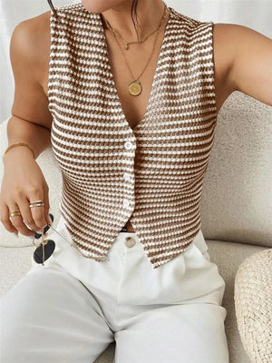 Chic striped knit v-neck tank top with button front, styled with white pants.