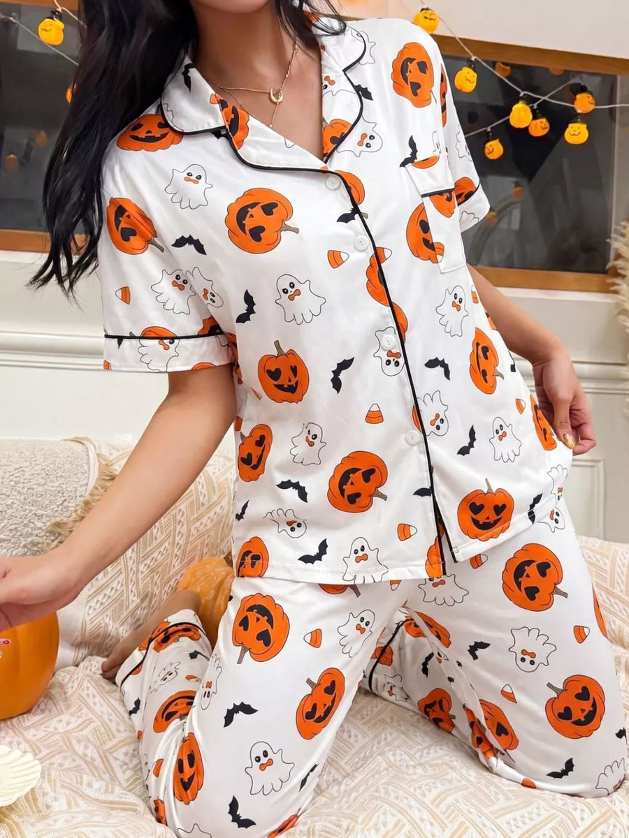 orange pajama set featuring two-piece and pumpkin print
