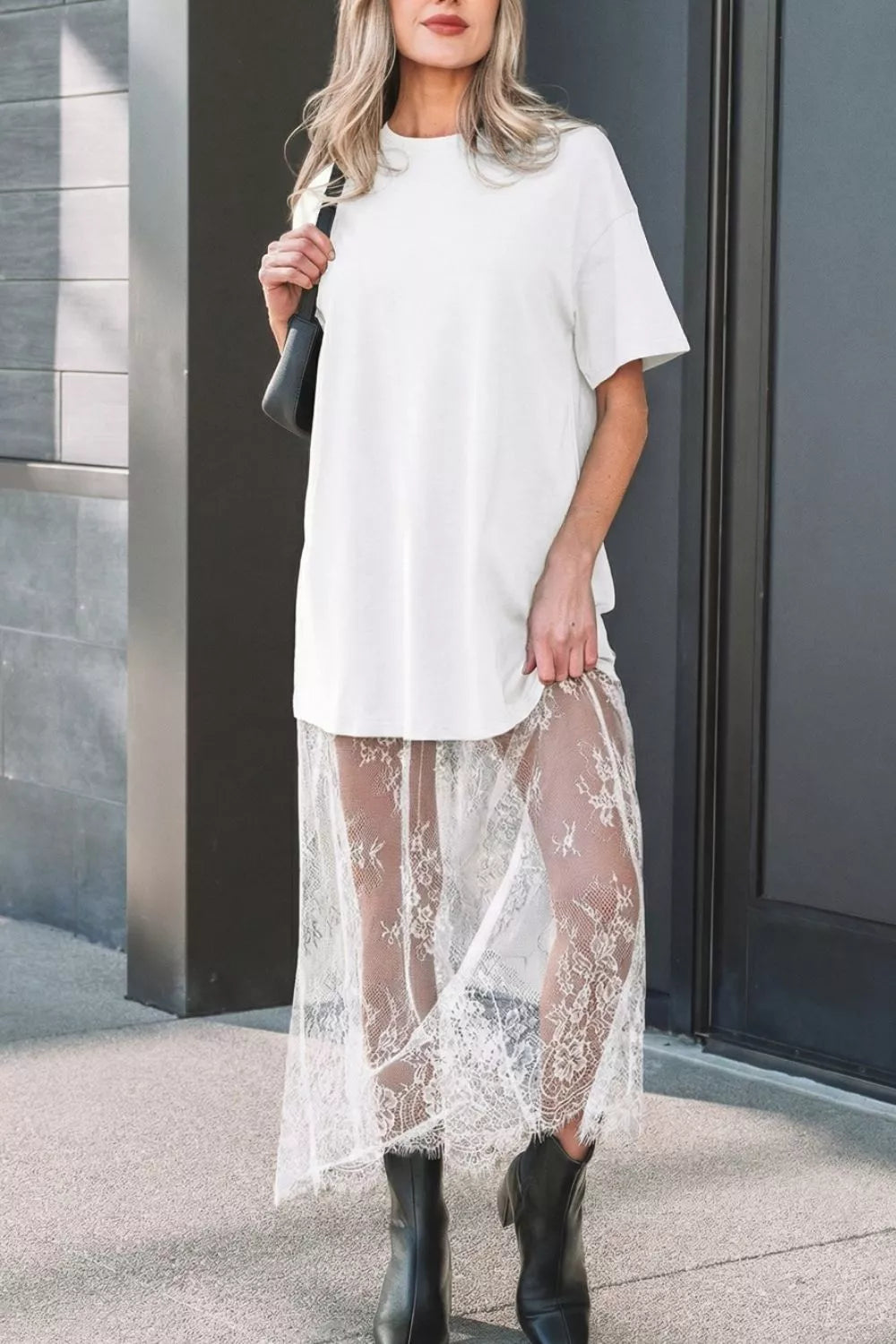 White cotton t-shirt midi dress with sheer lace overlay skirt and short sleeves.