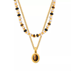 gold necklace with clasp and beaded