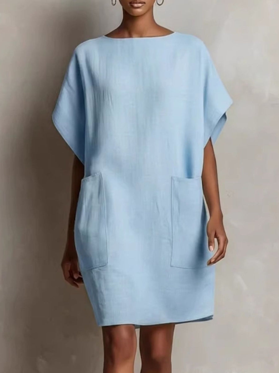 shift dress in light blue featuring pocketed and relaxed fit