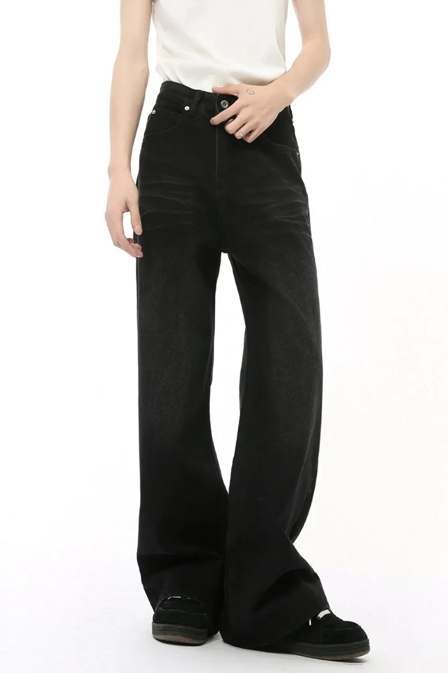 Black denim straight leg jeans with whiskered details.
