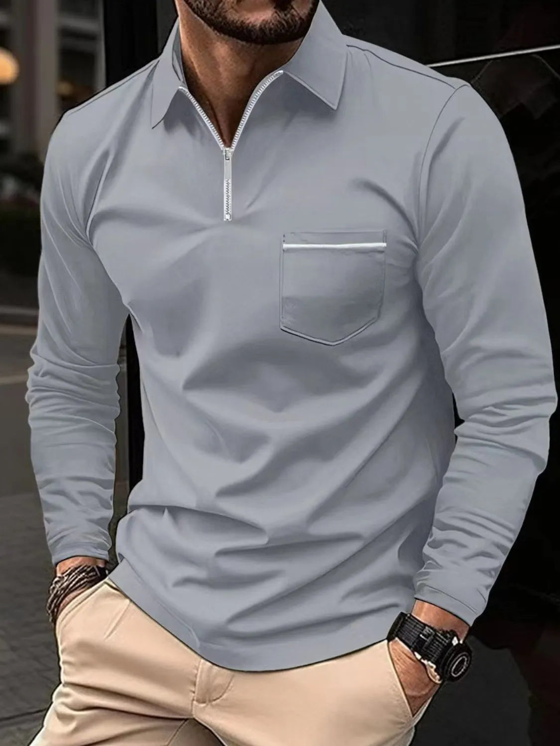 Gray long sleeve zip-front polo shirt with contrast pocket detail